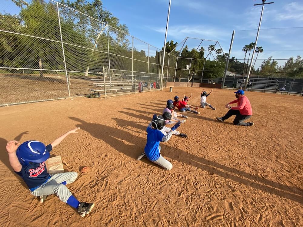 Teaching kids to slide.